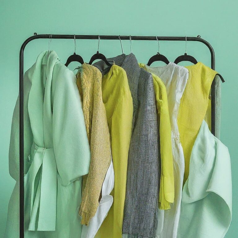 Sustainable fashion flat lay featuring organic cotton clothing on a neutral background